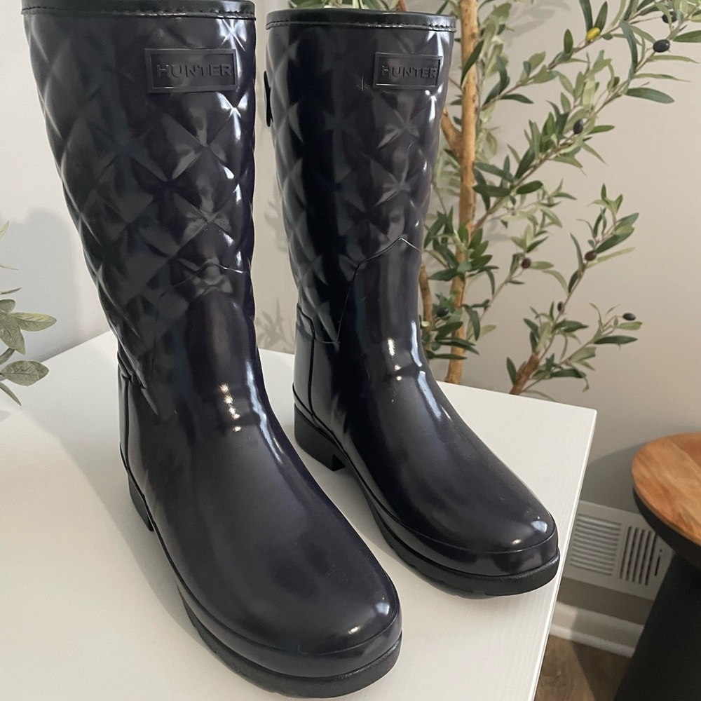 Hunter boots. Size 6. Never worn. Blueish purple.